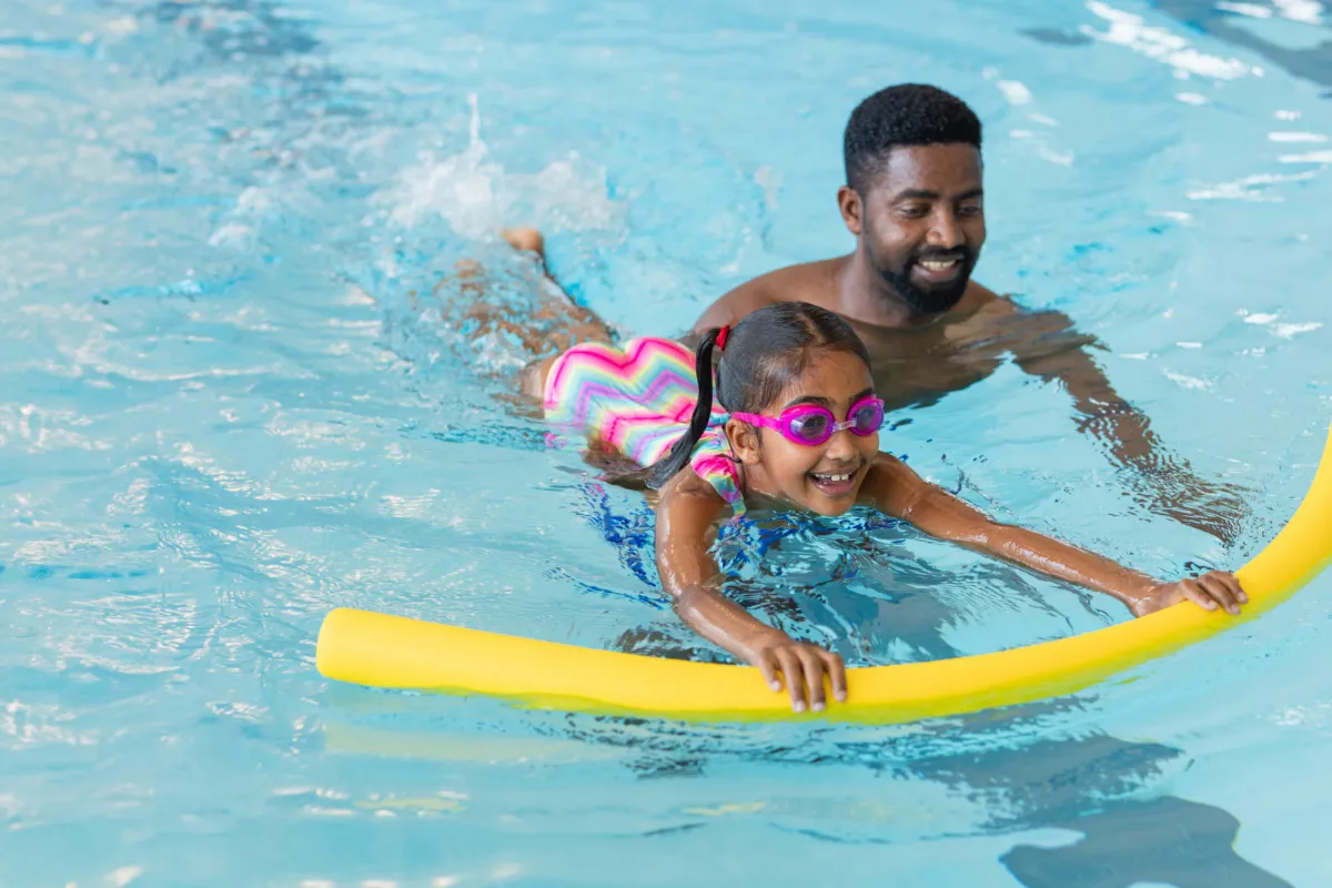 Father and Daughter Swimming