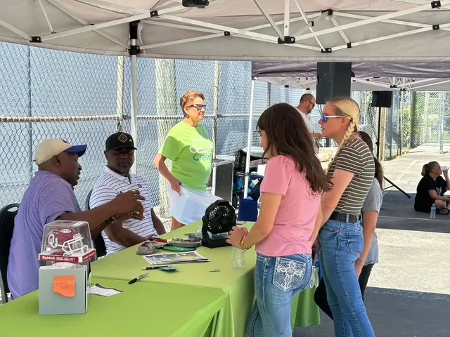 Retired NFL cornerback Ronnie Lippett (purple shirt) and retired MLB pitcher Tom Gordon (white shirt) spoke to attendees about how their faith and healthier habits shaped their lives as well as the importance of hard work and education.