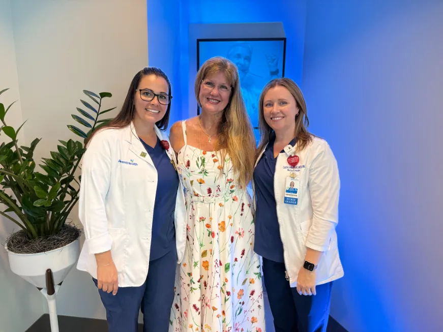 From left to right: Kelly Basset, director of critical care services and respiratory therapy at East Orlando; Tina McFarland, Donnie’s widow; and Caitlin Liebknecht, senior nurse manager at East Orlando.