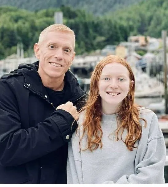 Jeff Bishop and his daughter in Alaska last summer before he got CAR T-cell treatment.