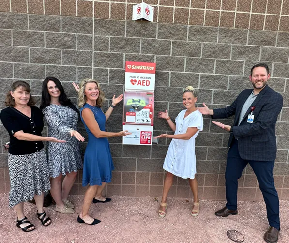 Kara stands outside the new AED at Redstone Elementary