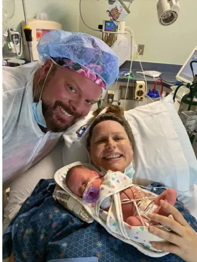  Shona Moeller and Bob Conlin with their newborn in 2020
