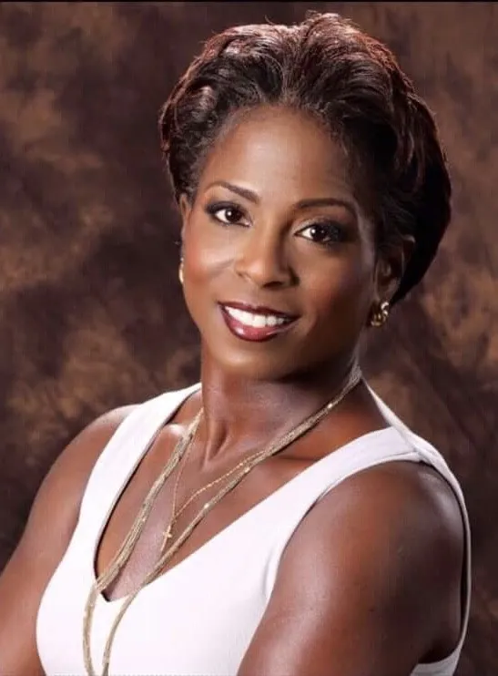 Woman with short hair posing for headshot