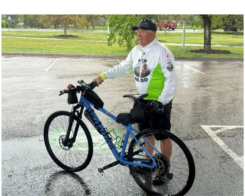 Mark Scotch being interviewed before riding to AdventHealth Porter.
