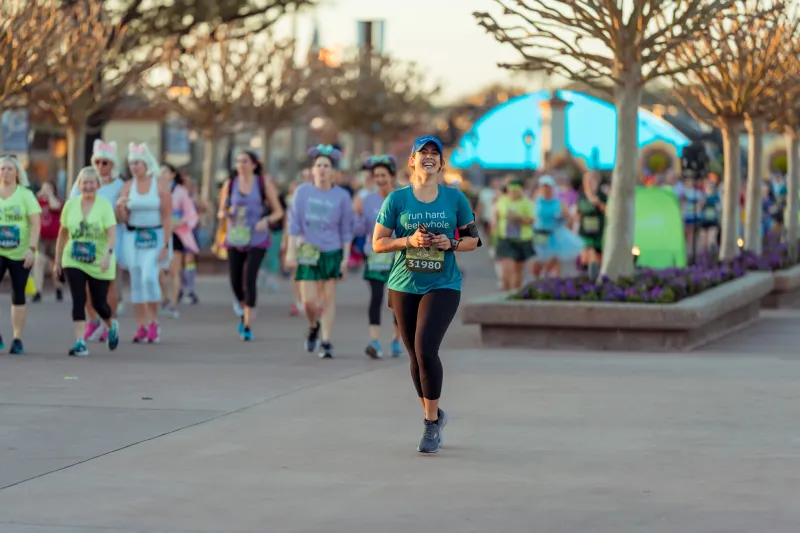 Woman running the runDisney Princess 10k.