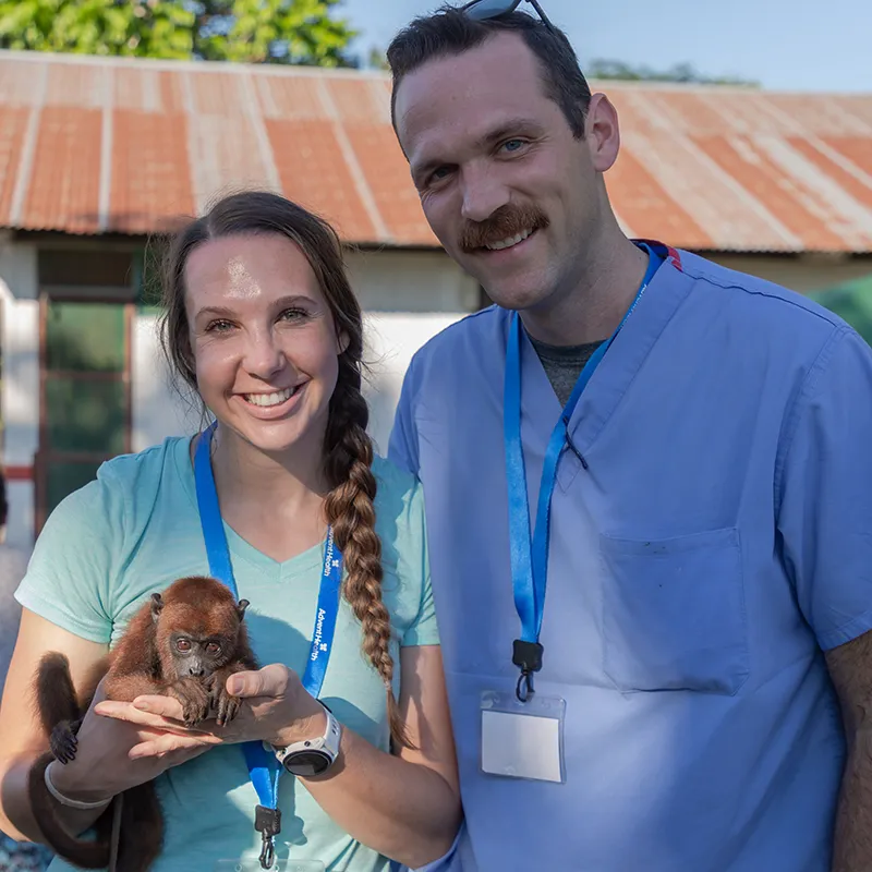 global-missions-peru-man-and-woman-with-monkey-800x800