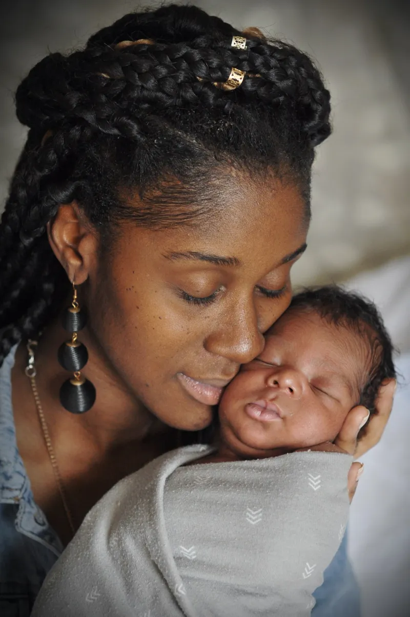 Woman holding her baby