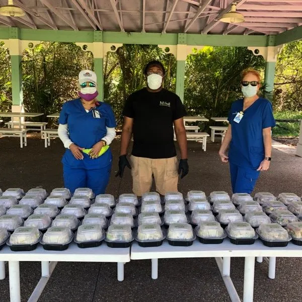 Healthcare workers with food donations