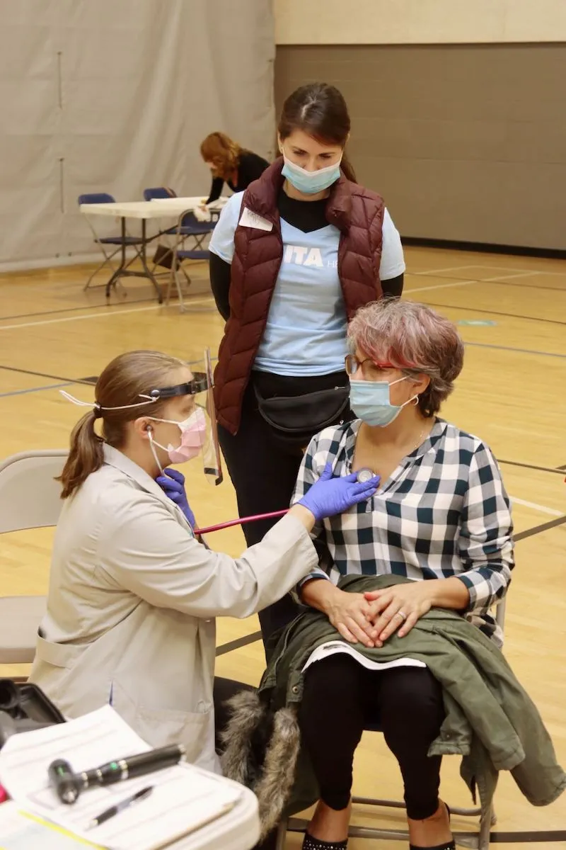 Volunteers wearing masks