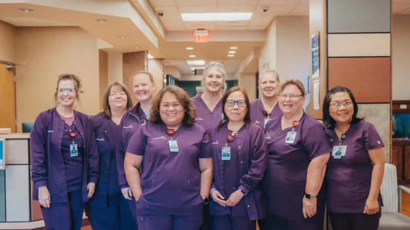 ottawa nursing department wearing purple scrubs