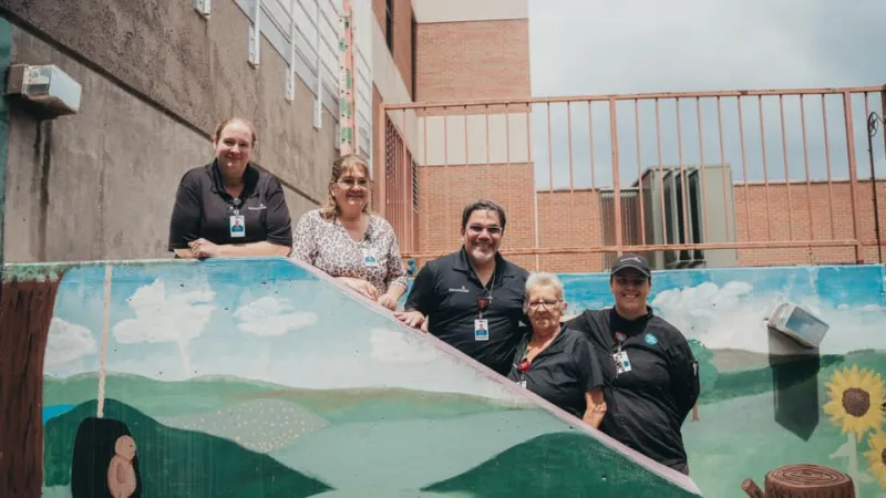 ottawa nutrition services standing on stairway