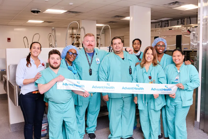 Group of physicians at the ribbon cutting of Wesley Chapel.